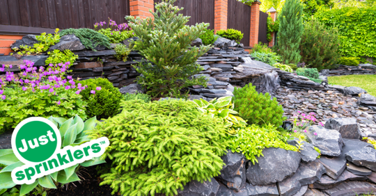 Unique natural rock landscaping in summer garden
