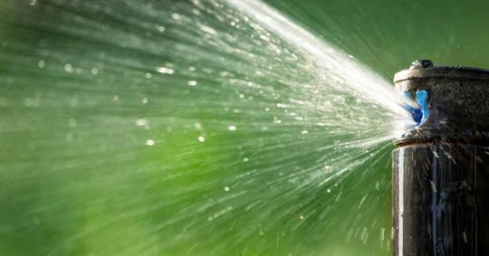 Nozzle of automatic lawn watering system