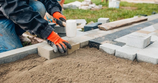 Laying stone tiles outdoors - pavers for walkways